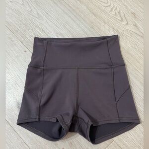 Lululemon biker shorts in a purple mauve color 2 short 2”